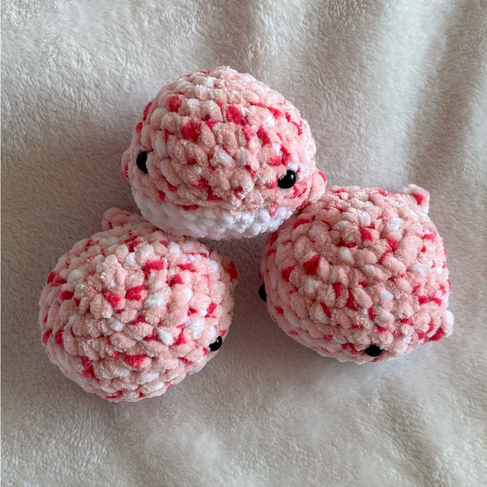 Handmade pink whale crochet plushies